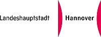 schwarzer Schriftzug auf weißem Untergrund